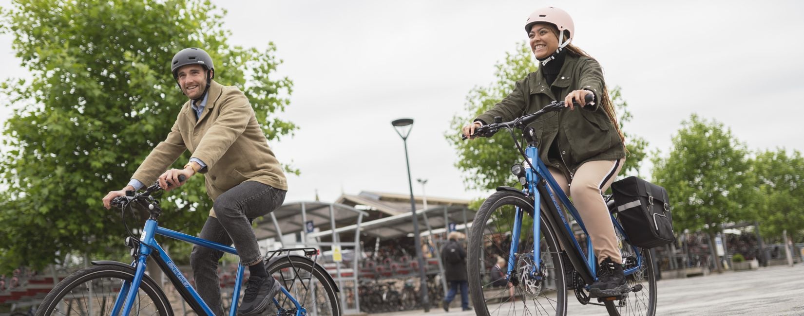Electric bike commuter riding through a UK city