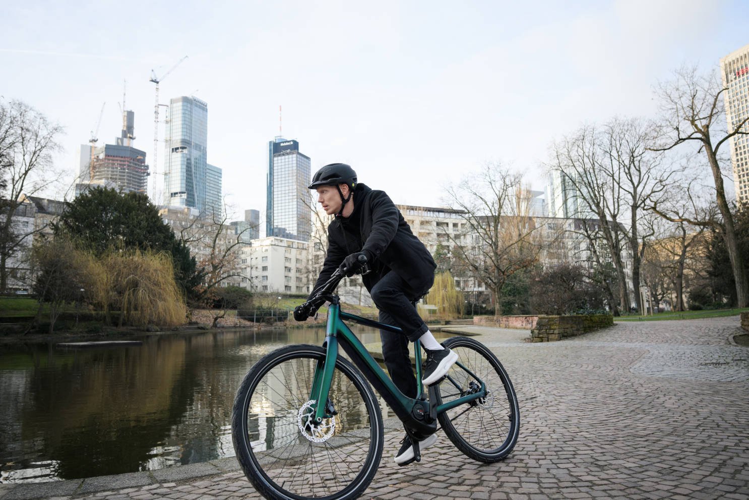 2024 Cube Editor Hybrid SLT 400X 400Wh Performance SX Belt Drive Electric Bike In Goblin Green Glossy Action Shot 1