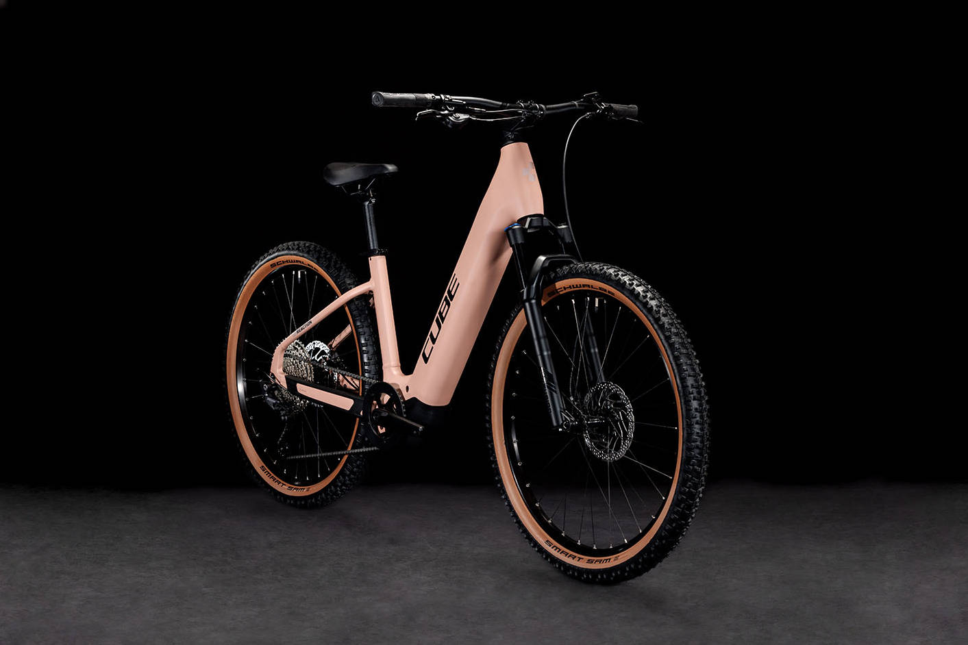 2024 Cube Reaction Hybrid Pro 625 Easy Entry Electric Hardtail Mountain Bike In Blush Rose & Silver Angled Front View
