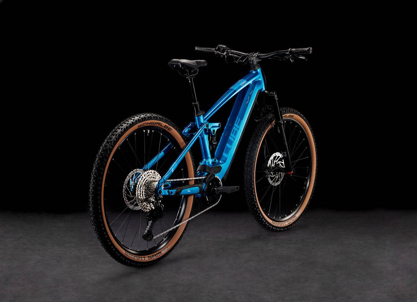 2024 Cube Stereo Hybrid 120 SLX 750 Electric Full Suspension Mountain Bike In Electric Blue Angled Rear View