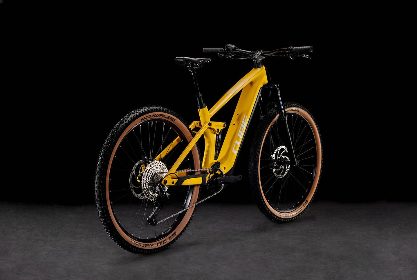 2024 Cube Stereo Hybrid 140 HPC Pro 750 Electric Full Suspension Mountain Bike In Vivid Sun Angled Rear View