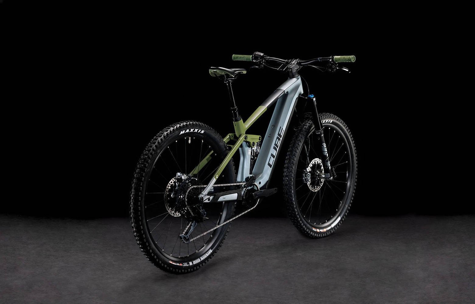 2024 Cube Stereo Hybrid 140 HPC TM 750 Electric Full Suspension Mountain Bike In Flash Grey Olive Angled Rear View