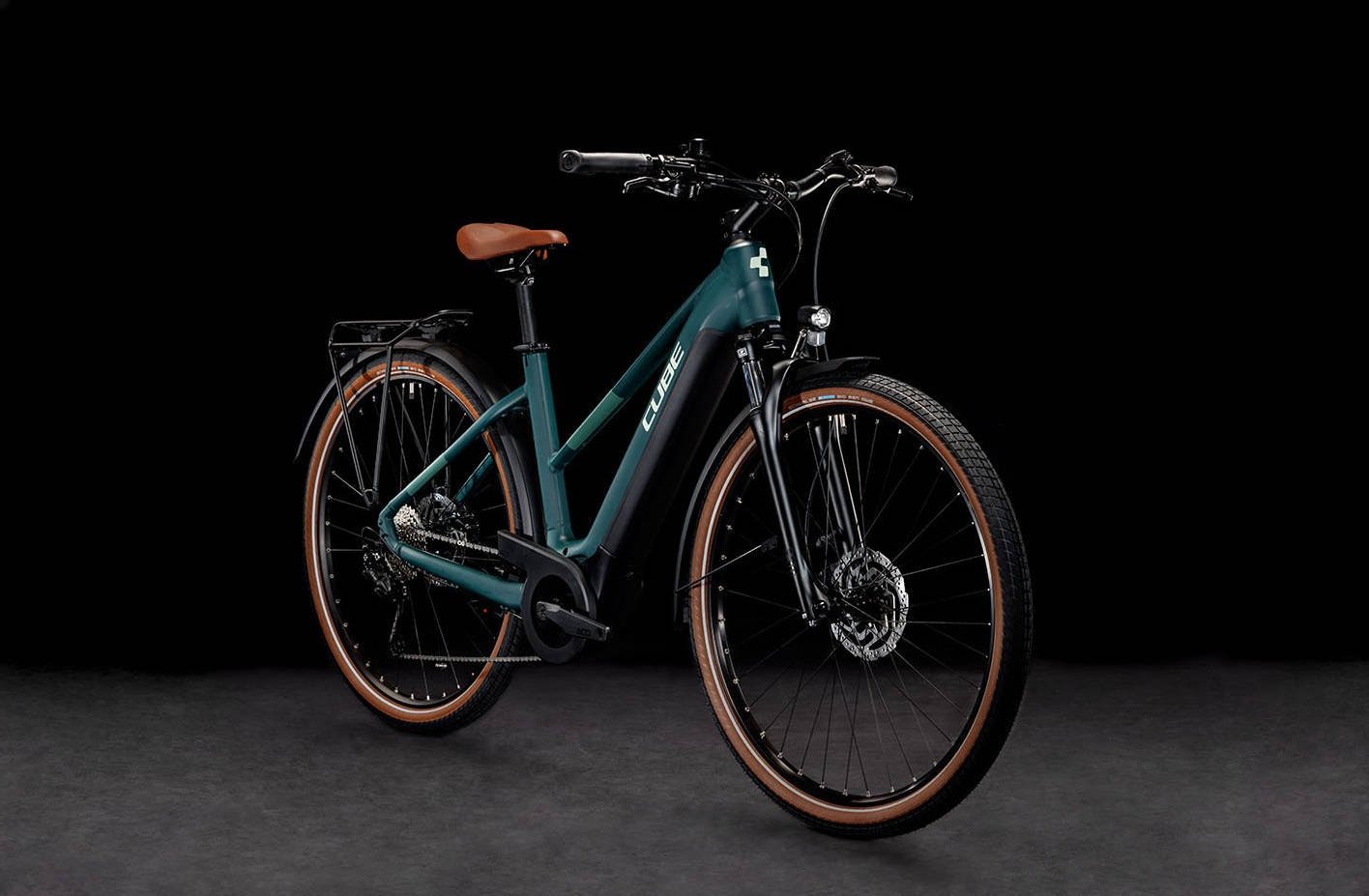 2024 Cube Touring Hybrid One 625 Trapeze Electric Bike In Dark Green Angled Front View