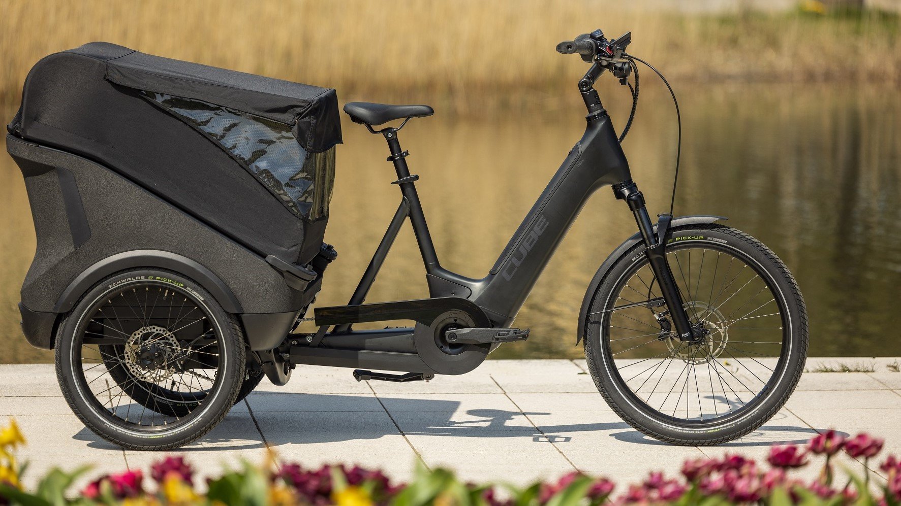 2024 Cube Trike Cargo Hybrid 1500 Electric Cargo Bike In Grey Reflex Scenic Shot 1