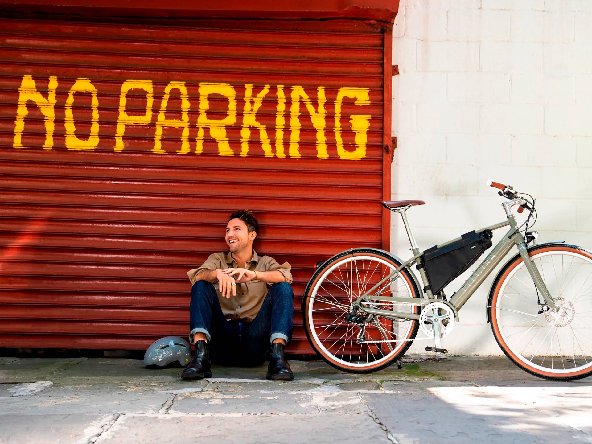 2025 Electra Loft Go! 7D EQ Step-Over Hub Motor Electric Bike In Harbor Grey Action Shot 1
