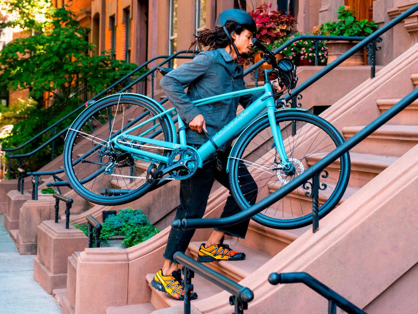 2025 Electra Loft Go! 7D EQ Step-Over Hub Motor Electric Bike In Matte Cadet Blue Action Shot 1