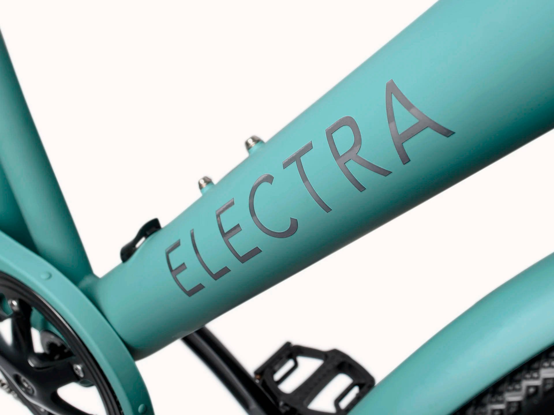 2025 Electra Loft Go! 7D EQ Step-Over Hub Motor Electric Bike In Matte Cadet Blue Downtube Logo