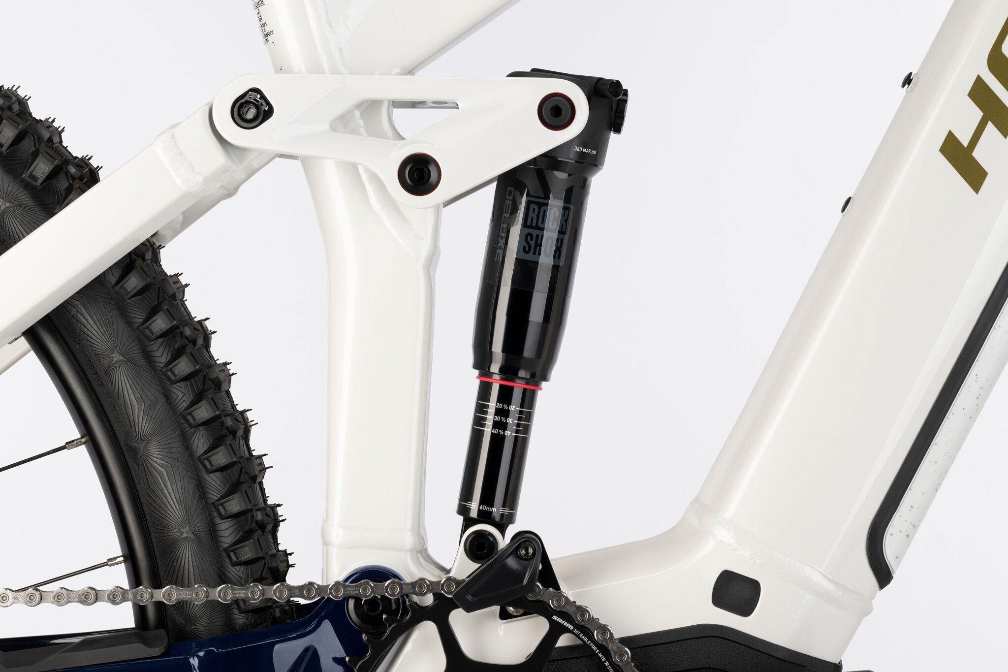 2025 Haibike AllTrail 8 High Electric Full Suspension Mountain Bike In White, Blue Gold Gloss Rear Shock