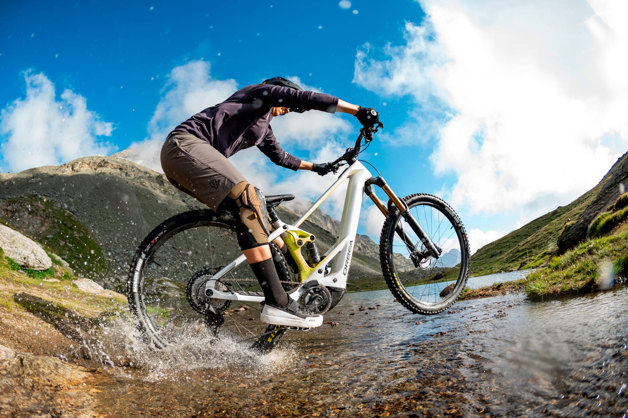 2025 Orbea Wild M20 750Wh Electric Full Suspension Mountain Bike Action Shot 1