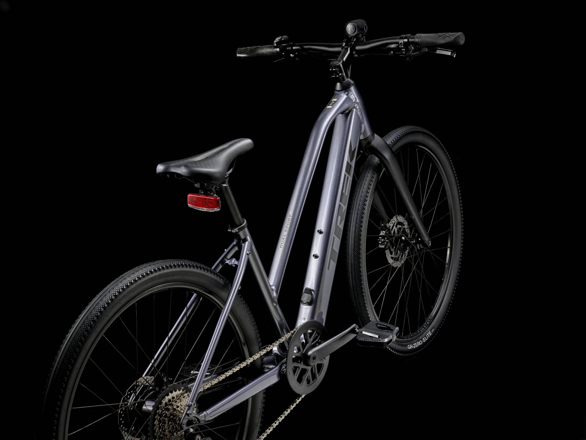 2025 Trek Dual Sport+ 2 Mid-Step LT Hub Motor Electric Bike In Galactic Grey Angled Rear View