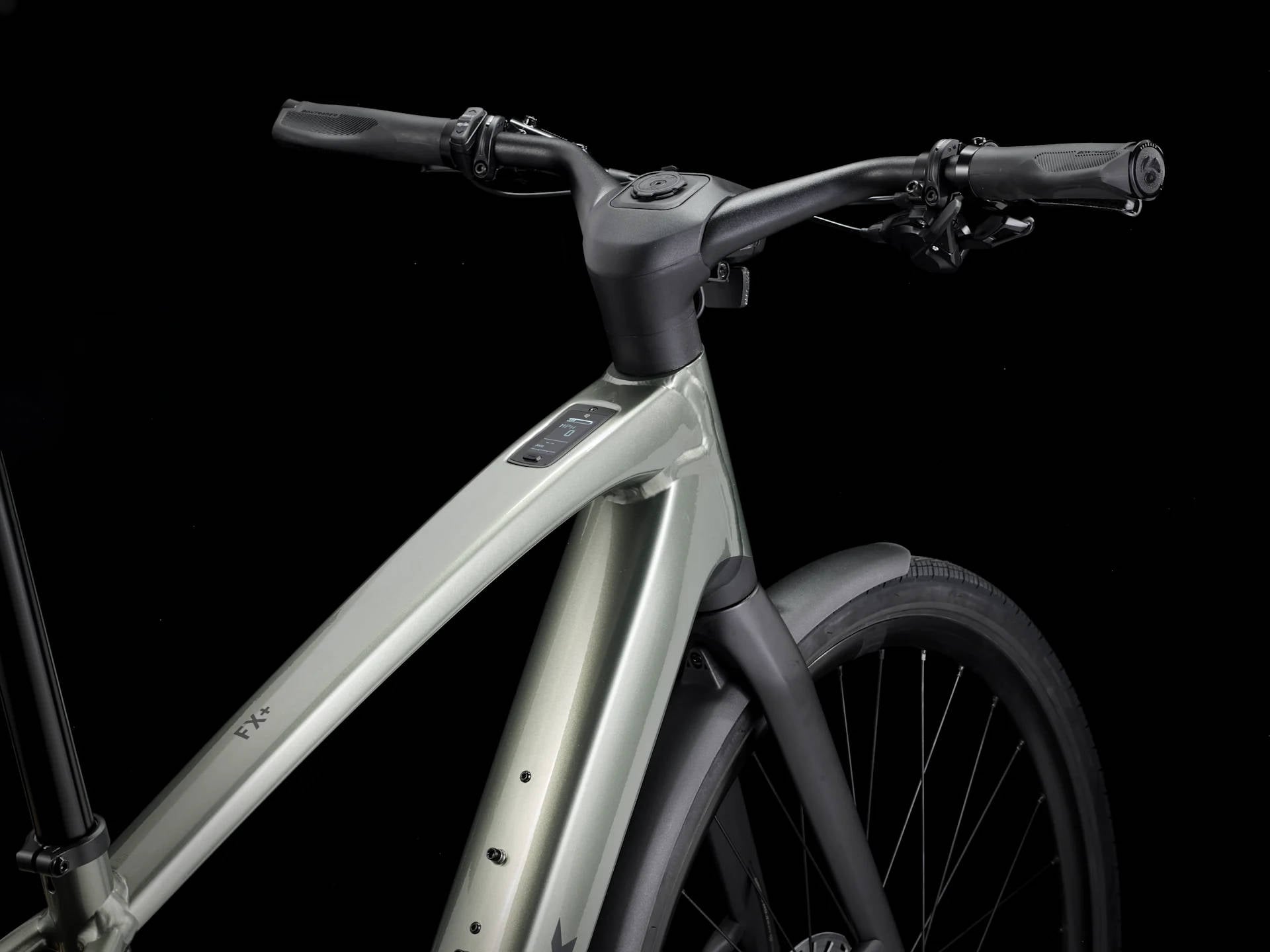 2025 Trek FX+ 7 Electric Bike In Lichen Green Gloss Cockpit