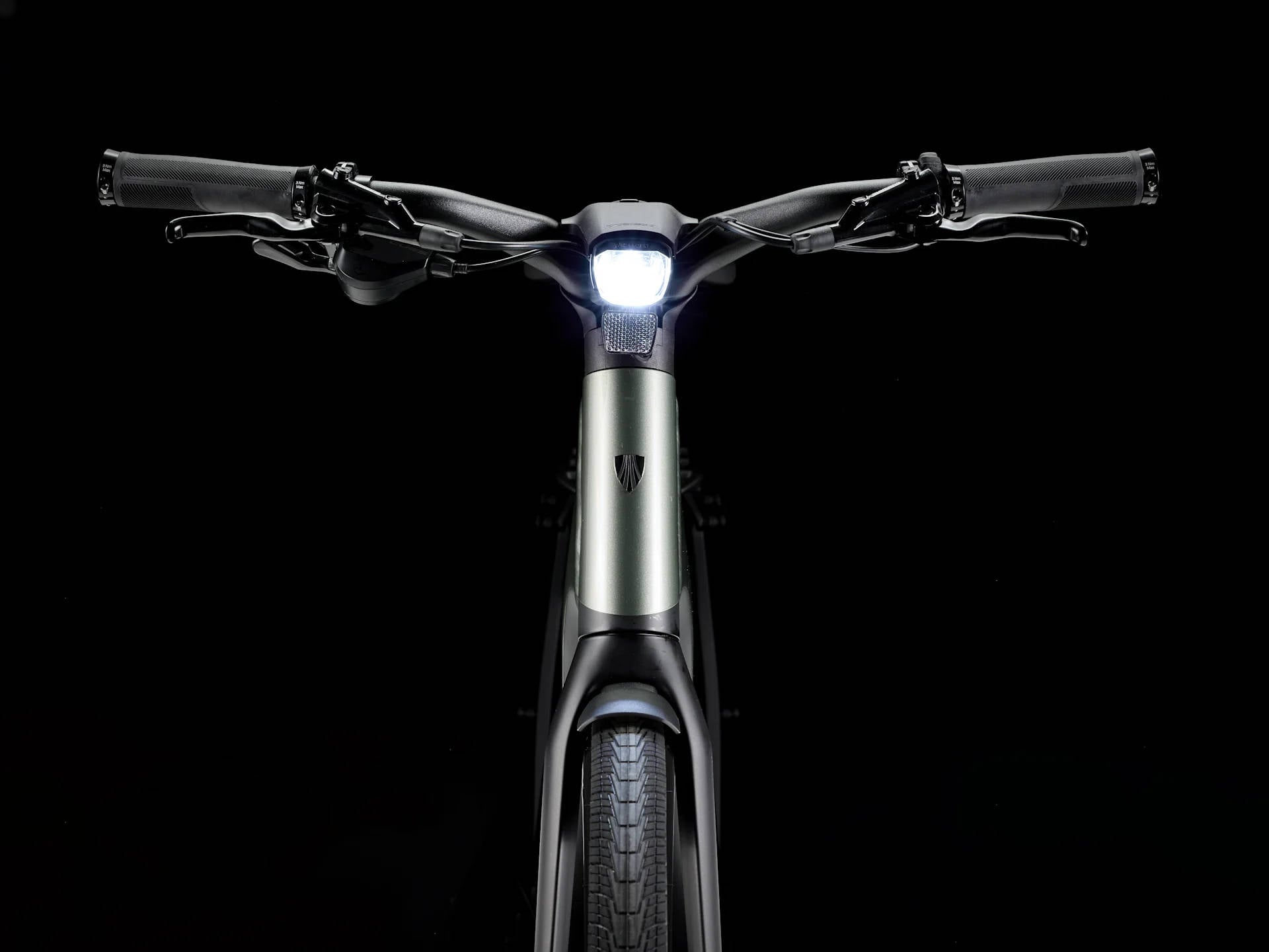 2025 Trek FX+ 7 Electric Bike In Lichen Green Gloss Handlebar and Headlight