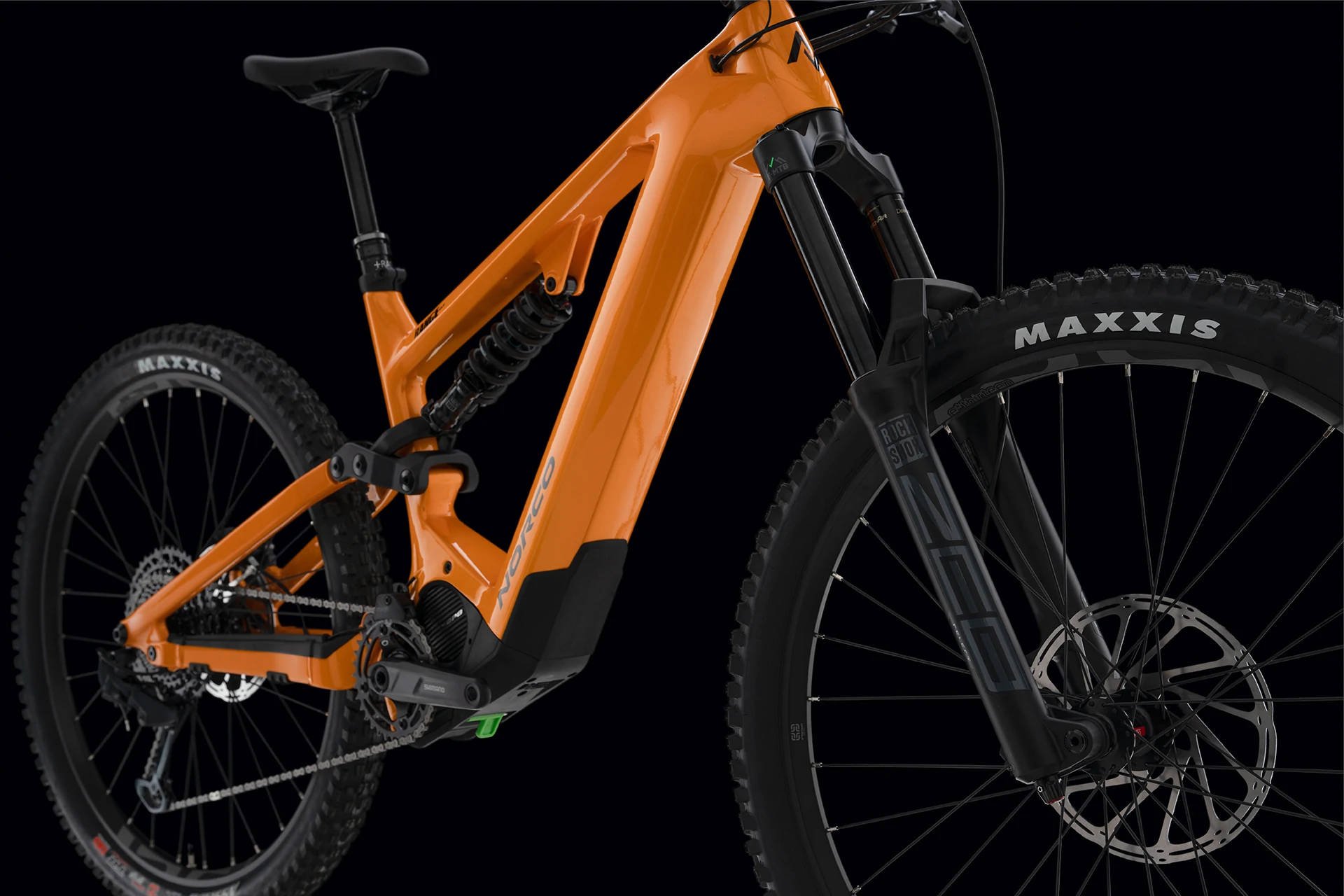 Norco Range VLT C2 Electric Full Suspension Mountain Bike in Orange Black Angled Front Close Up View