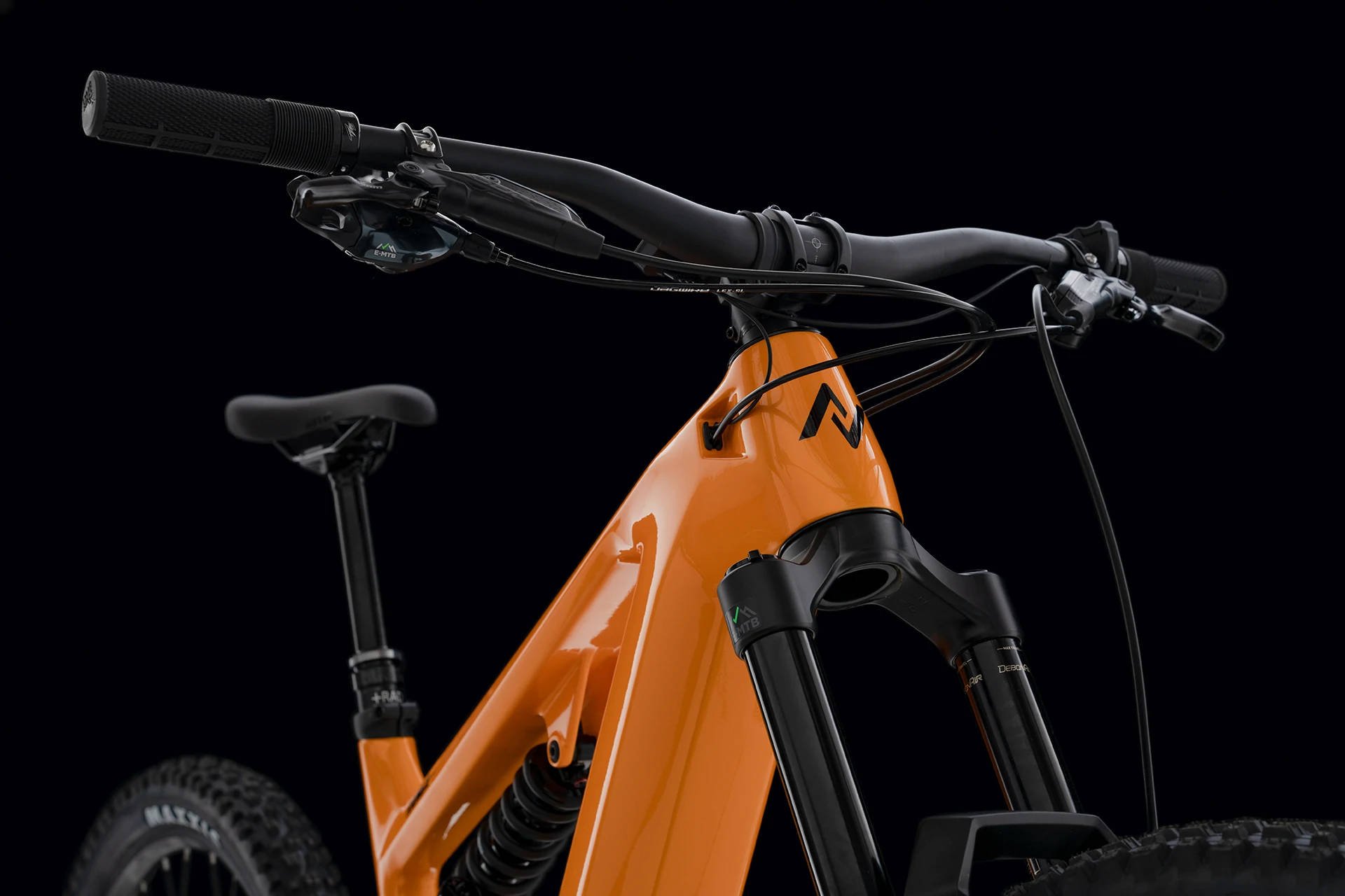 Norco Range VLT C2 Electric Full Suspension Mountain Bike in Orange Black Stem and Fork