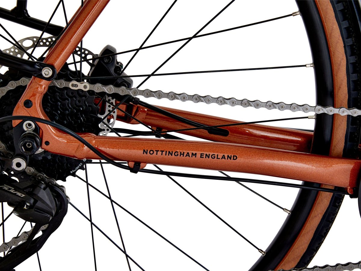 Raleigh Trace Electric Gravel And Commuter Bike In Copper Red