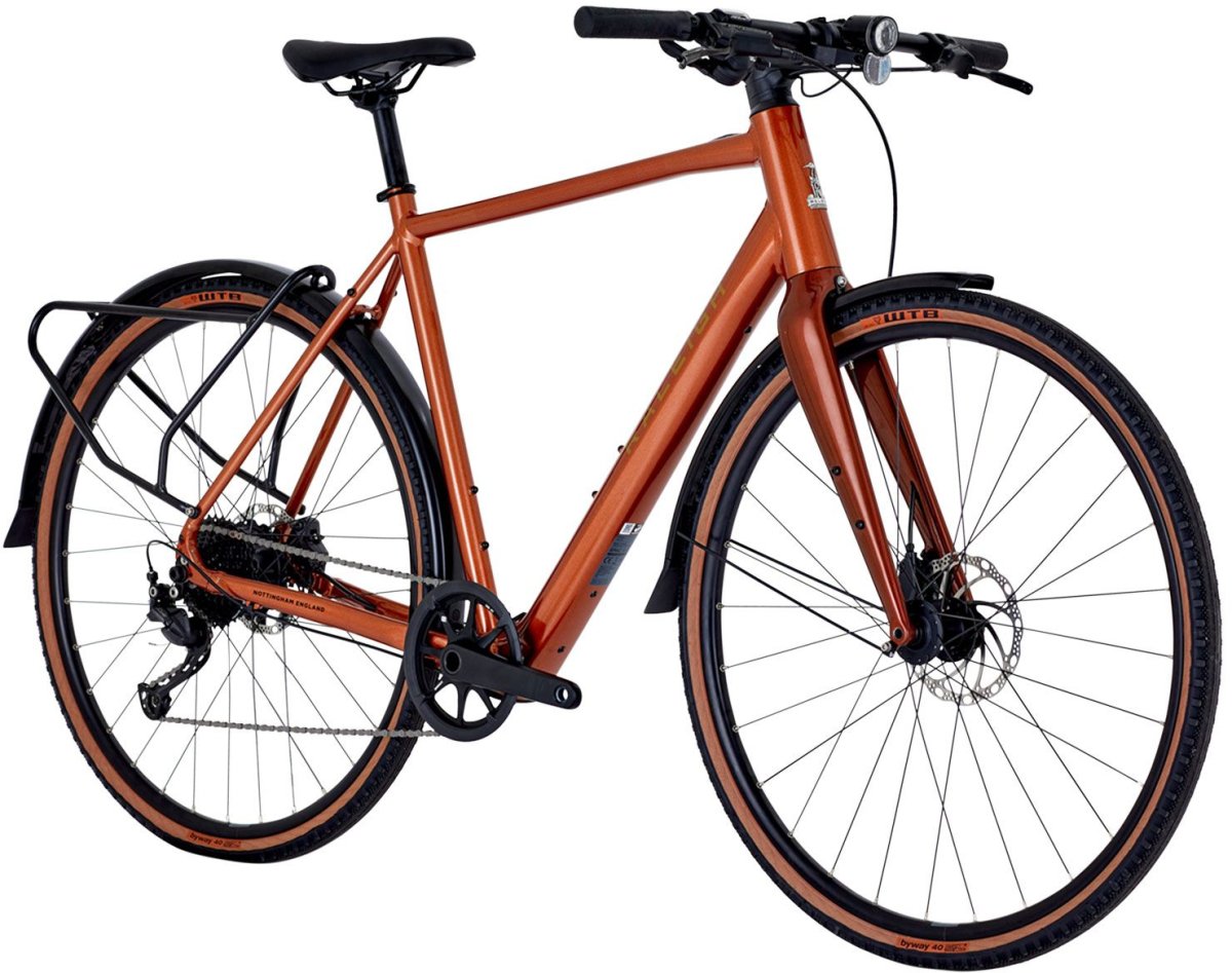 Raleigh Trace Electric Gravel And Commuter Bike In Copper Red